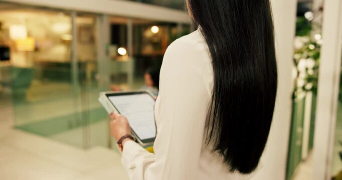 Business people, night or tablet with team for delegation, work tasks or project at office building. Employees, group or colleagues passing technology in late evening at workplace for company process