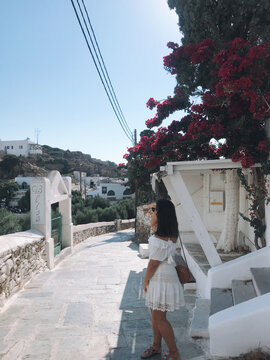 Fototapeta young woman walking on greek street
