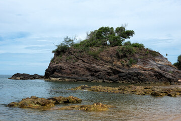 Tranquil Coastal View of Pantai Kuala Kemasik with Rocky Shoreline, Terengganu, Malaysia - This serene coastal scene captures the natural beauty of Pantai Kuala Kemasik in Terengganu, Malaysia.