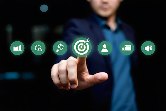 Businessman targeting goals with digital interface