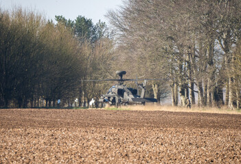 British army Boeing Apache Attack helicopter AH2 AH64E AH-64E AAc refuelling in woodland copse