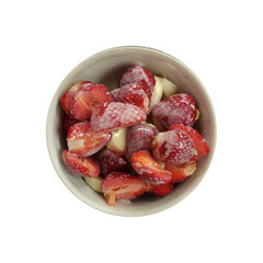 Fresh strawberries in a bowl with creamy topping for a delightful dessert