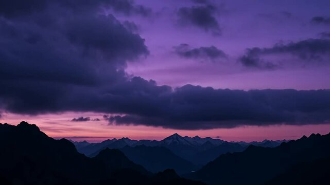 Timelapse of Dramatic Sunset Over Mountain Range with Storm Clouds