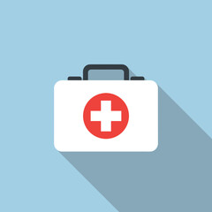 Obraz premium A first aid kit on a blue background, symbolizing health and safety in emergencies