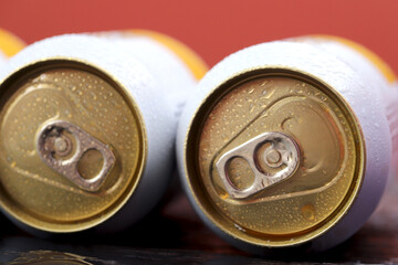 Obraz premium Cold canned beer ready to drink in the fridge
