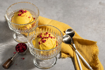 Mango and passion fruit ice cream ball