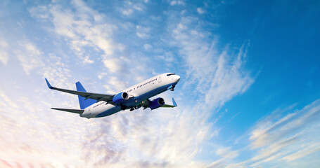 Airplane flying in the blue sky, summer air travel concept, airplane in the flight, airplane background