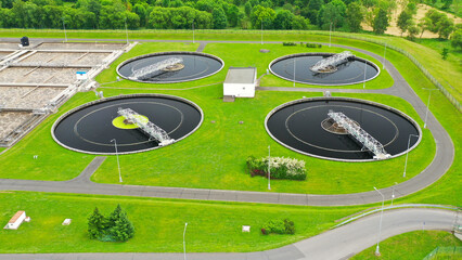 Aerial view to sewage treatment plant. Grey water recycling. Waste management in European Union.	