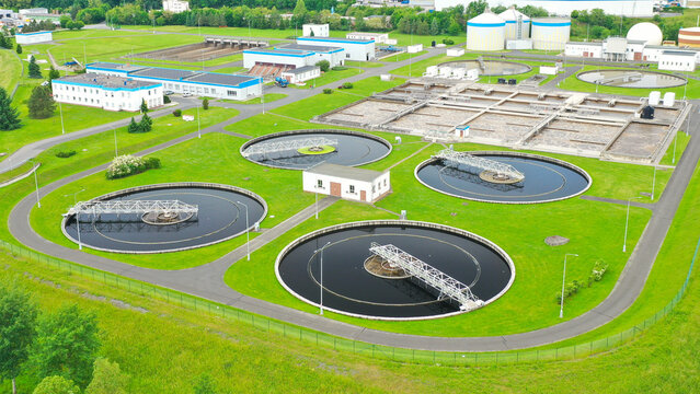 Aerial view to sewage treatment plant. Grey water recycling. Waste management in European Union.	