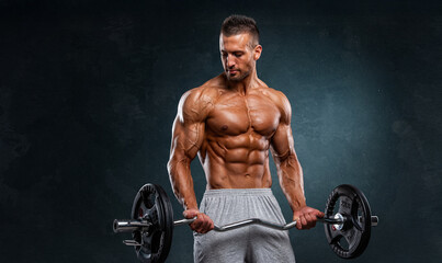 Muscular Young Man Exercise with Weights, Lifting Weights