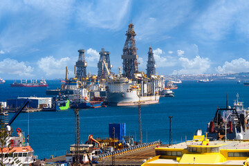 Panoramic view of the Astican shipyard in the port of Las Palmas with oil rigs, supply vessels and industrial port infrastructure on Gran Canaria