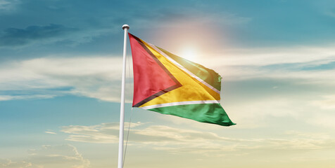 Guyana national flag waving in beautiful sky with mast. A proud moment flag waving with sunlight.