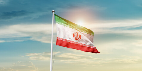 Iran national flag waving in beautiful sky with mast. A proud moment flag waving with sunlight.
