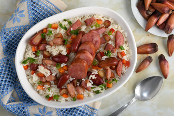 A delicious Brazilian dish of rice with sausage, bacon and pine nuts
