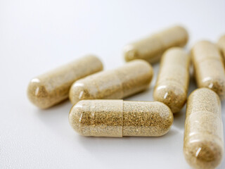 Herbal medicine capsule isolated on white background, Close-up of Herbal medicine capsule