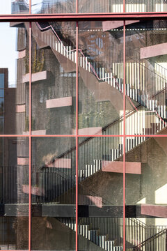 Modernist architecture with vertical window rhythms in Copenhagen, highlighting linear composition, clarity and design structure for architectural SEO themes.