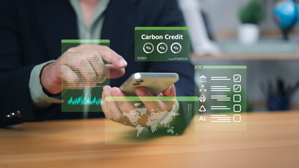 Hands interact with holographic phone interface displaying carbon credit, data, and AI. Symbolizes digital finance, sustainable investment, and tech-driven environmental solutions for the future now.