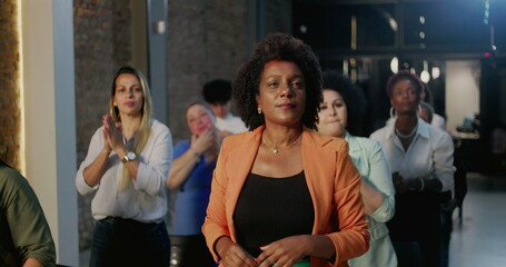 Diverse group of people praying passionately during spiritual worship gathering in a modern church, expressing faith and devotion in a heartfelt atmosphere