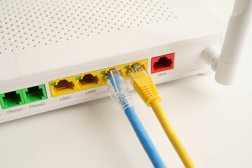 Ethernet cable with wireless router connect to internet service provider network.
