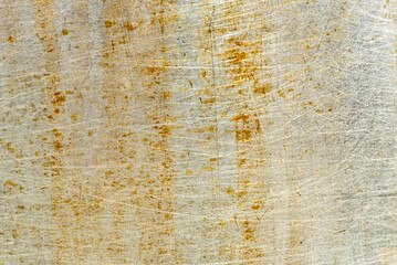 brown rust metal texture. Yellow metal background. Light. Shine