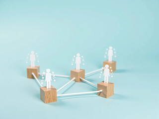 Wooden Cubes Connected with Lines on Blue Background Representing Social Network and Organizational Structure, Illustrating Teamwork, Digital Communication, and Business Collaboration