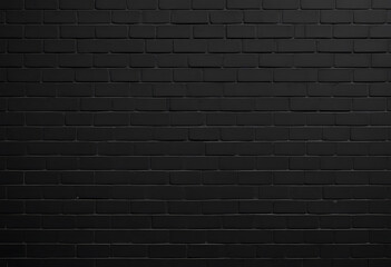 Textured black brick wall displaying a detailed and uniform patterned appearance
