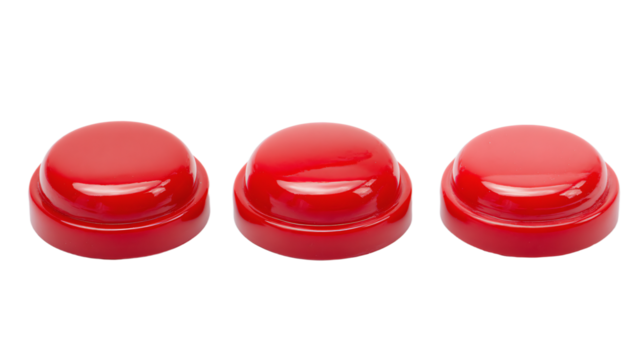 three red push buttons on a white surface