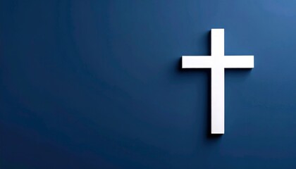 Obraz premium Elegant symbolic cross against a deep navy backdrop minimalist design