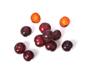 Heap of Red plums fruit isolated on white background.