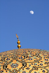 The moon over the dome of the Lotf Allah Mosque, Isfahan, Iran