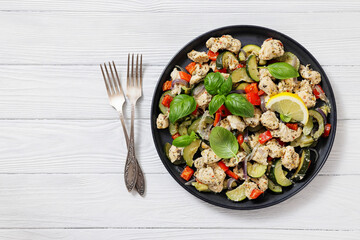 baked italian chicken and vegetables on a plate