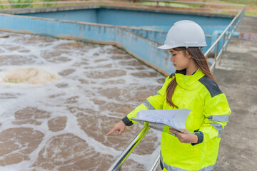 Environmental engineers work at wastewater treatment plants,Water supply engineering working at...