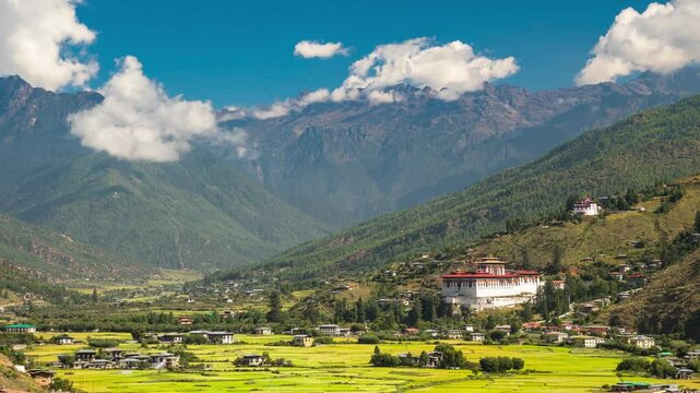 Looking out over the city of Paro in Bhutan. The Rinpung Dzong can be seen. Time Lapse.