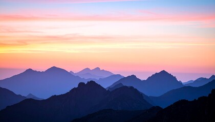 Obraz premium Majestic Mountain Range at Dusk Captivating Silhouette and Colorful Sky