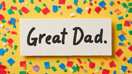 "Great Dad" Written on White Paper with Colorful Confetti on Yellow Background. Festive Atmosphere for Father's Day