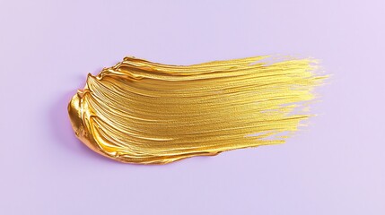 A radiant gold smear stroke brightly on a pastel lilac background, creating a refined and minimalist look.