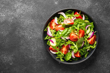 Fresh salad with leaves and vegetables.
