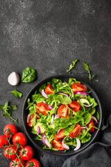 Fresh salad with leaves and vegetables.