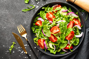Fresh salad with leaves and vegetables.