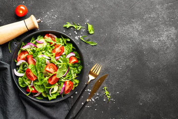 Fresh salad with leaves and vegetables.