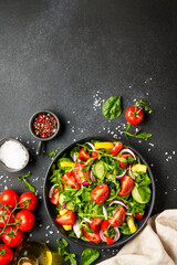 Fresh salad with leaves and vegetables.