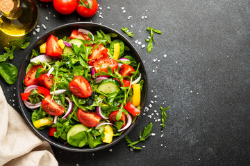 Fresh salad with leaves and vegetables.