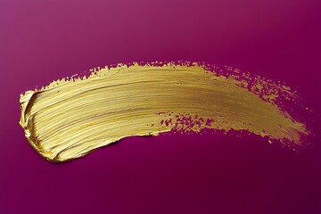 A refined gold brushstroke on a deep magenta background, with a faint gold blot smear spreading outward, forming a striking abstract composition.