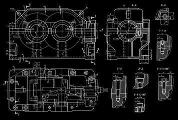 Engineering mechanical drawing of steel devices
- worm gear housing (reducer, gearbox, engine)
with dimension lines.
Cad scheme on paper sheet. Technology background
of machine building industry.