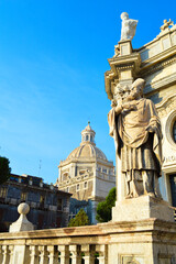 Historic Catania: Baroque Cathedral Architecture & Statues Under Blue Sky