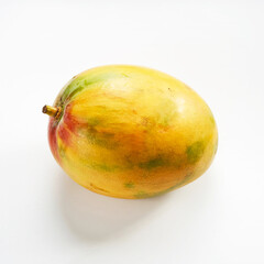 Ripe and colorful mango fruit on white background isolated for healthy eating concepts