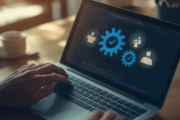 Businessman working with laptop shows gear sign