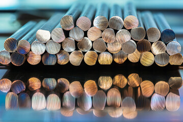 Steel rods displaying the metal structure, stacked  products of the metallurgical industry