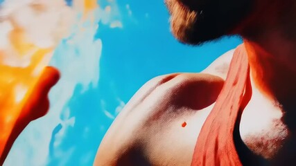 Refreshing summer drink with athletic man against vibrant sky backdrop - Powered by Adobe