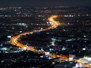 Expressway, Self-driving autonomous electric cars of the future with HUD elements move along a busy traffic intersection. Concept: Artificial Intelligence, Car Scan, GPS Tracking, Smart Roads, IoT